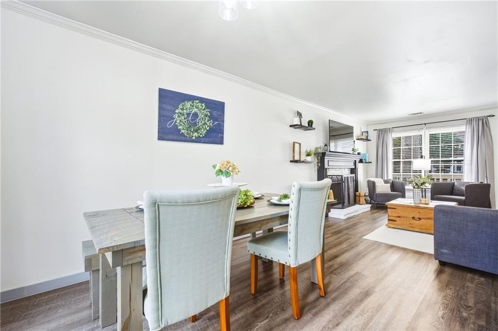 2763 Farmstead Road Smyrna, GA 30080 - Photo 17 of 35 a living room with furniture and a table