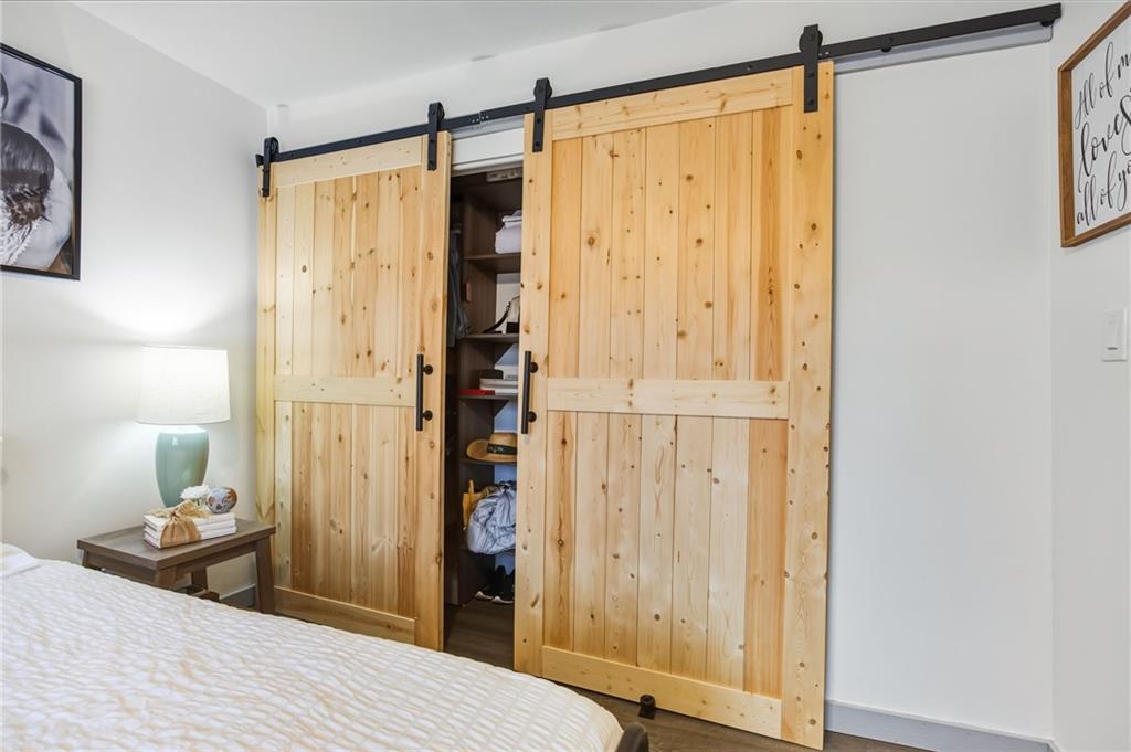 2763 Farmstead Road Smyrna, GA 30080 - Photo 24 of 35 a bedroom with a bed and a table