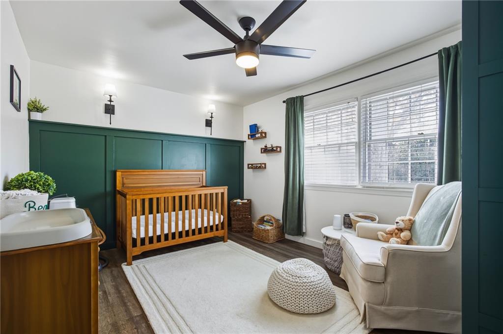 2763 Farmstead Road Smyrna, GA 30080 - Photo 26 of 35 a bedroom with furniture and a large window