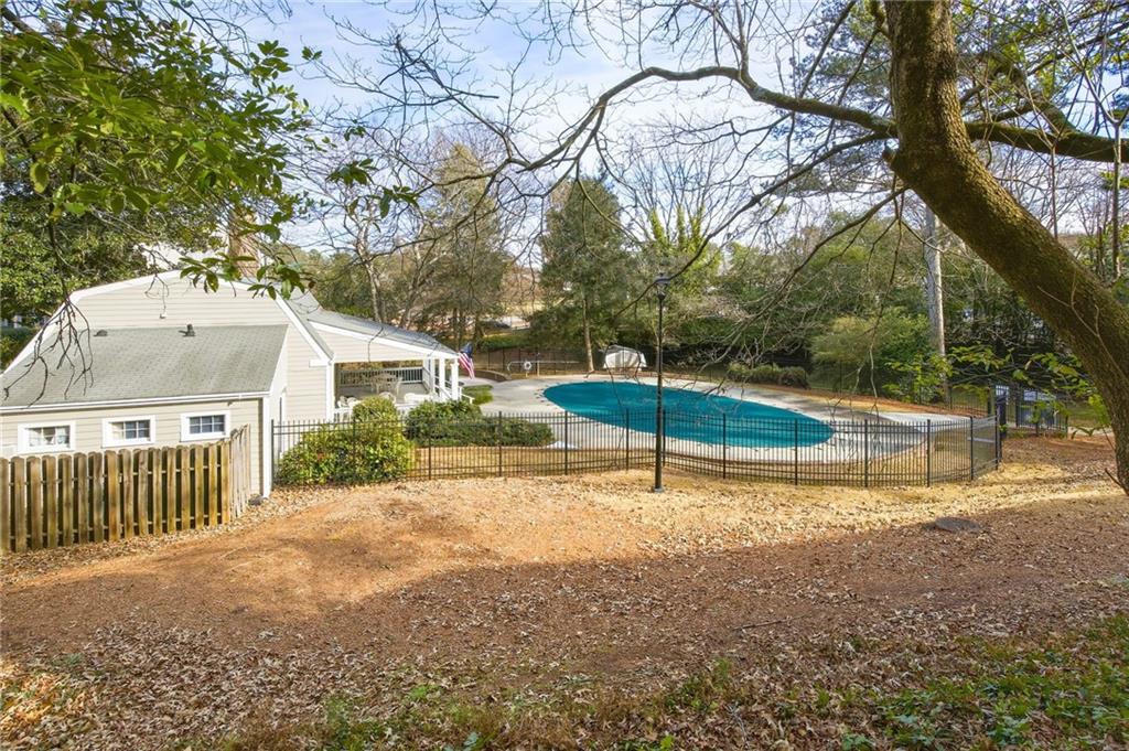 2763 Farmstead Road Smyrna, GA 30080 - Photo 30 of 35 a view of a house with a yard