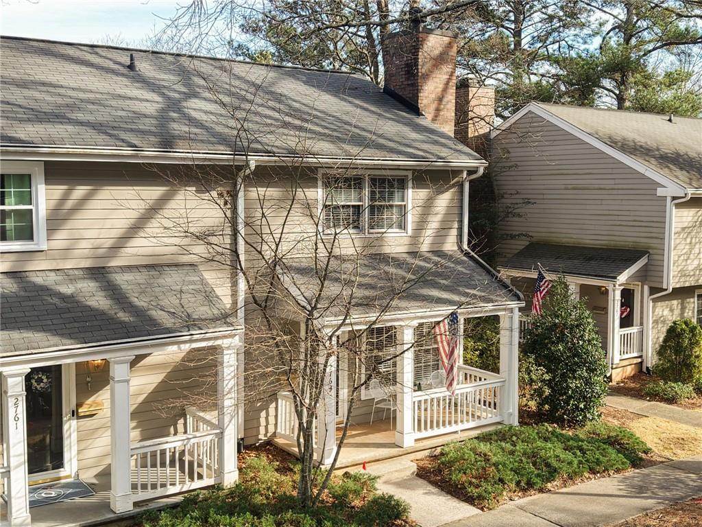 2763 Farmstead Road Smyrna, GA 30080 - Photo 32 of 35 a view of a white house with a large window and large windows