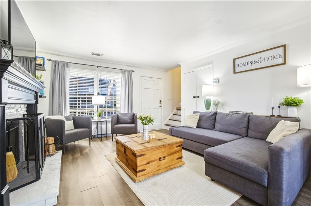 2763 Farmstead Road Smyrna, GA 30080 - Photo 7 of 35 a living room with furniture and a large window
