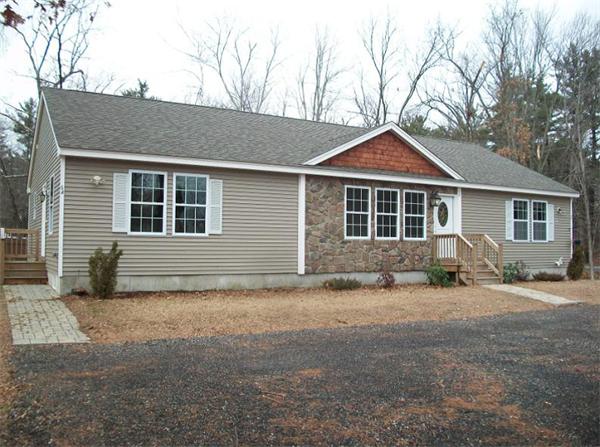 a house with trees in the background