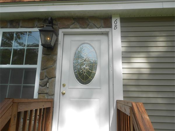 6 Longfellow Road, Unit B Groton, MA 01450 - Photo 2 of 11 a close view of door lock
