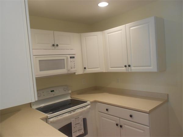 6 Longfellow Road, Unit B Groton, MA 01450 - Photo 6 of 11 a room with cabinets
