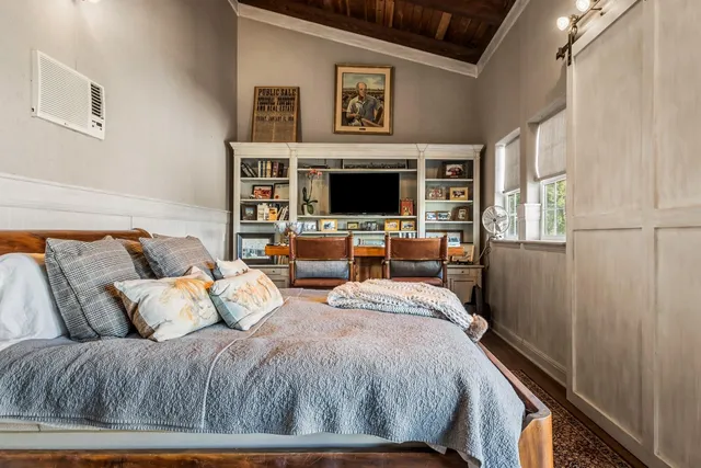 a kitchen with a sink and a mirror