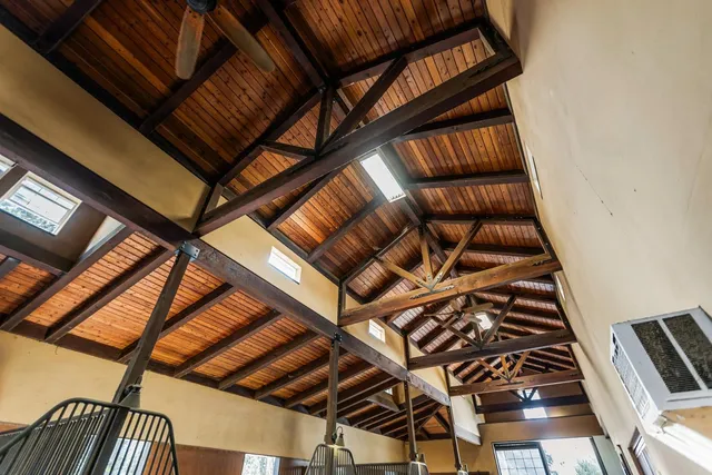 a front view of house with yard and outdoor seating