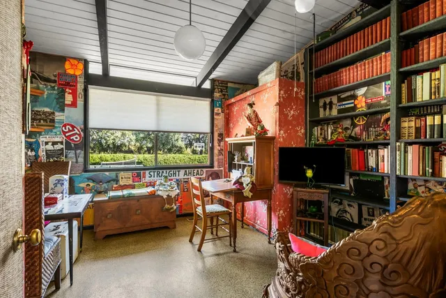 a outdoor space with patio lots of furniture and black umbrella