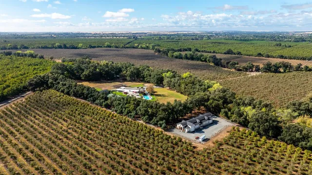 a view of a street with a lake