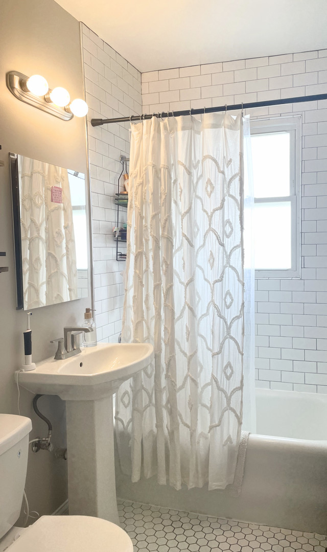 1919 A Grove Avenue, Unit 34 Berwyn, IL 60402 - Photo 14 of 21 a bathroom with a sink and a mirror