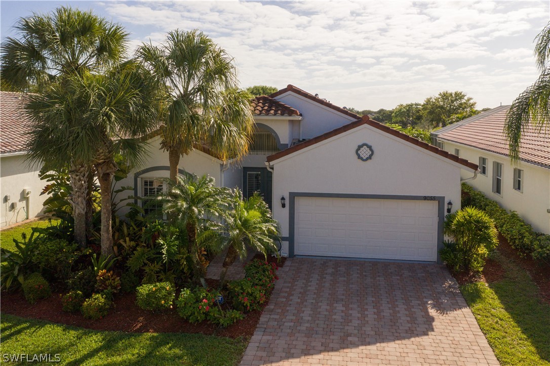 9055 Springview Loop Estero, FL 33928 - Photo 1 of 35 a house view with a backyard space
