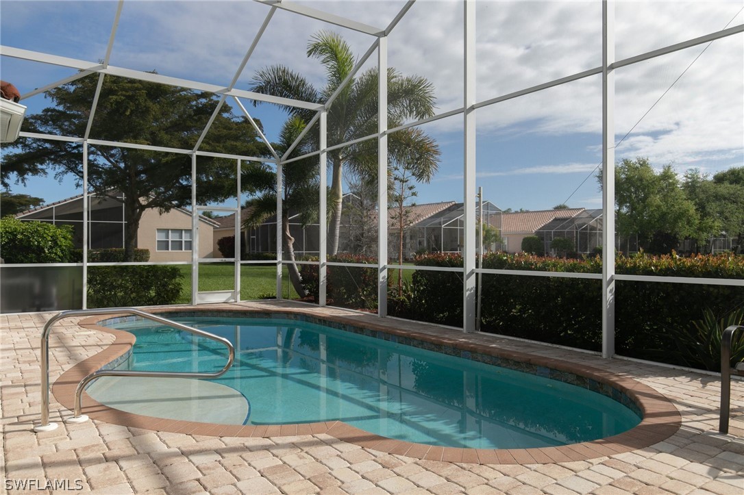 9055 Springview Loop Estero, FL 33928 - Photo 26 of 35 a view of outdoor space with swimming pool