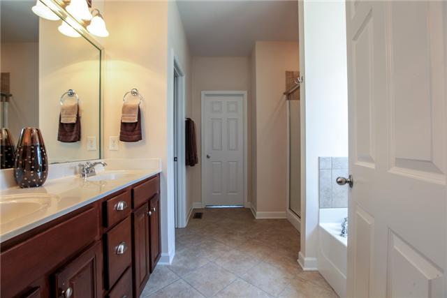 1012 Red Pepper Ridge Spring Hill, TN 37174 - Photo 11 of 20 Master Bath With Double Vanities and Large Walk-In Closet.