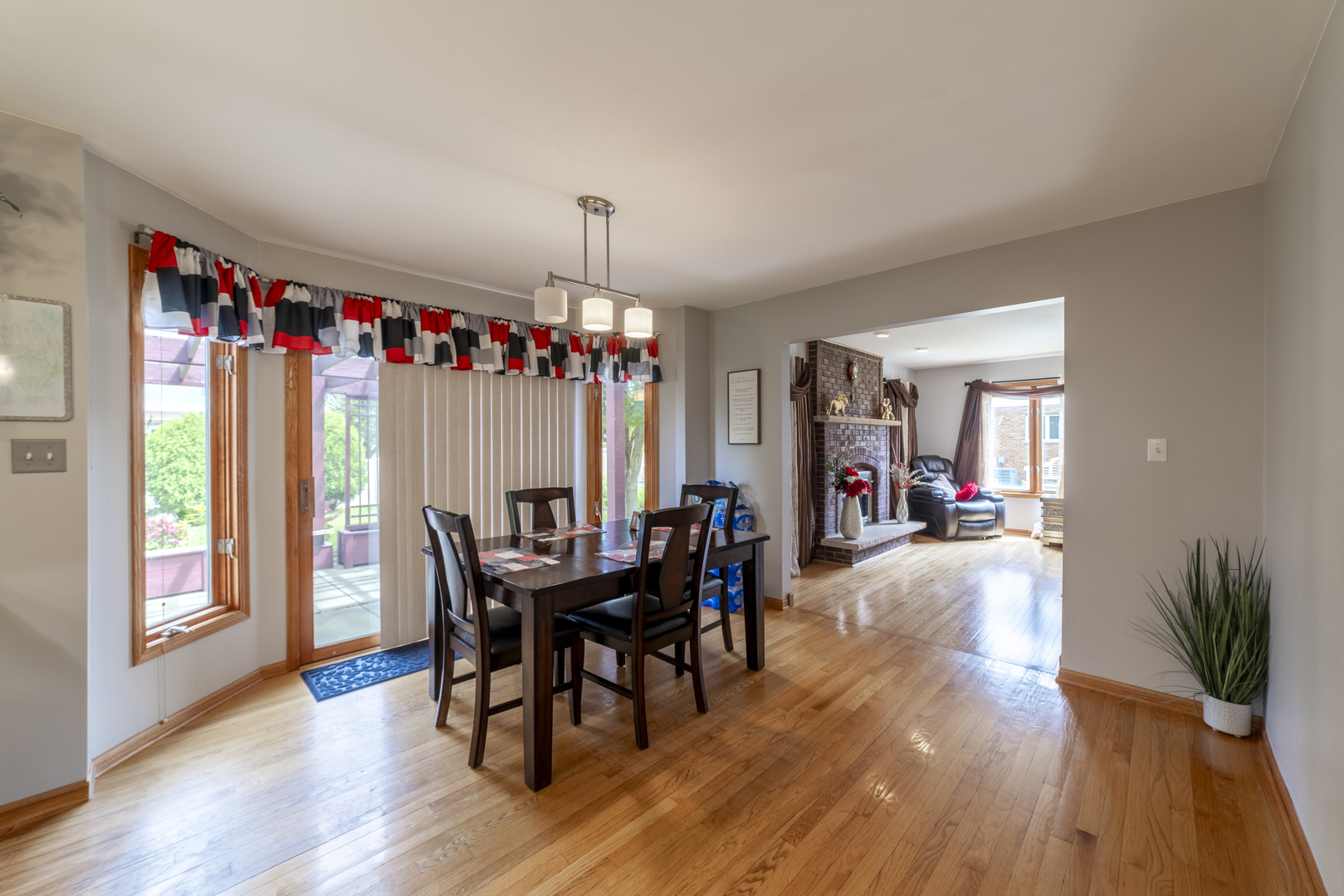 1071 Yamma Ridge New Lenox, IL 60451 - Photo 13 of 51 a view of a dining room with furniture window and wooden floor