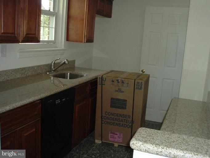 8613 Riggs Road Hyattsville, MD 20783 - Photo 2 of 8 Kitchen