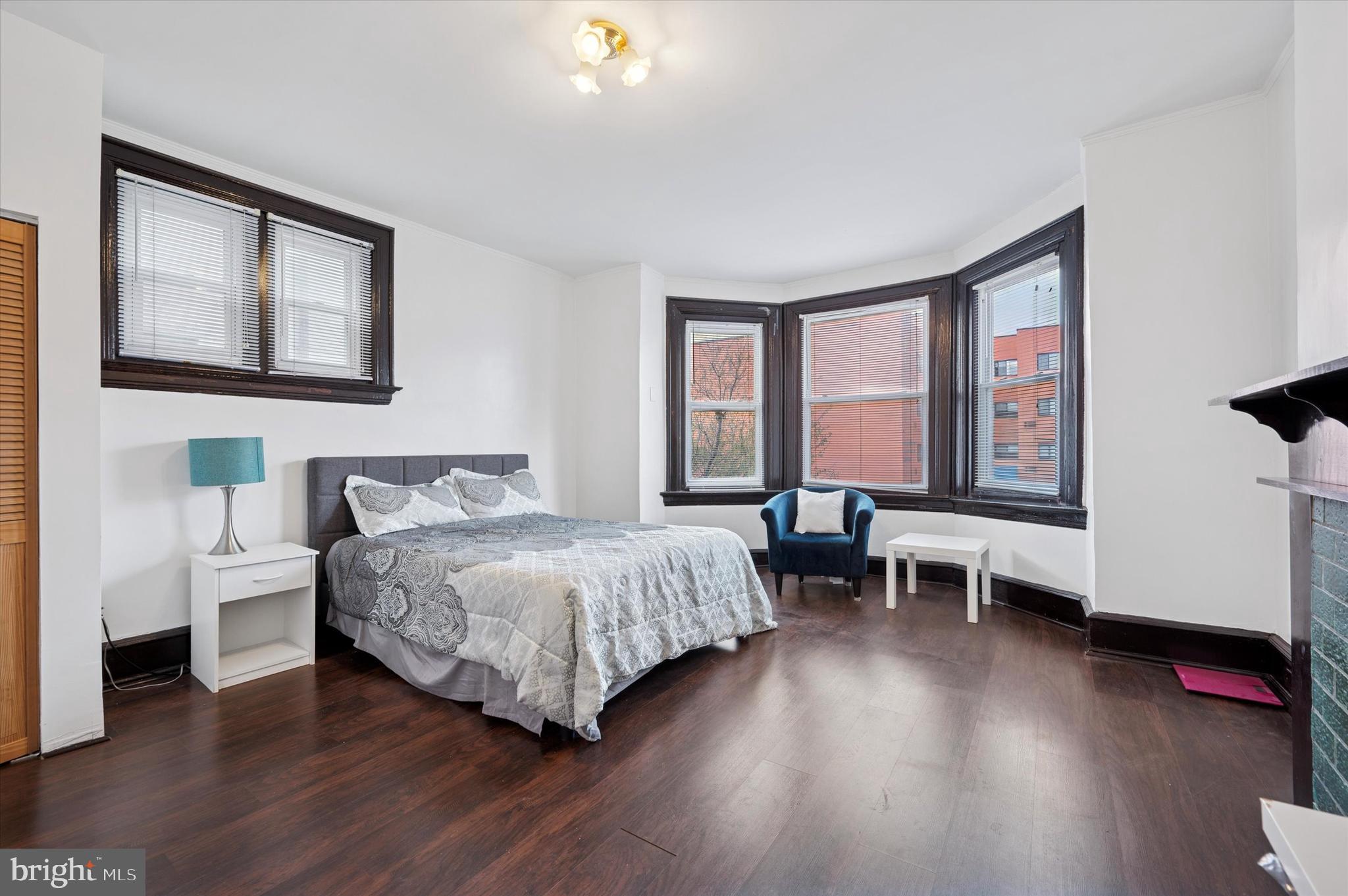 4518 Walnut Street Philadelphia, PA 19139 - Photo 11 of 36 a bedroom with a bed and a window