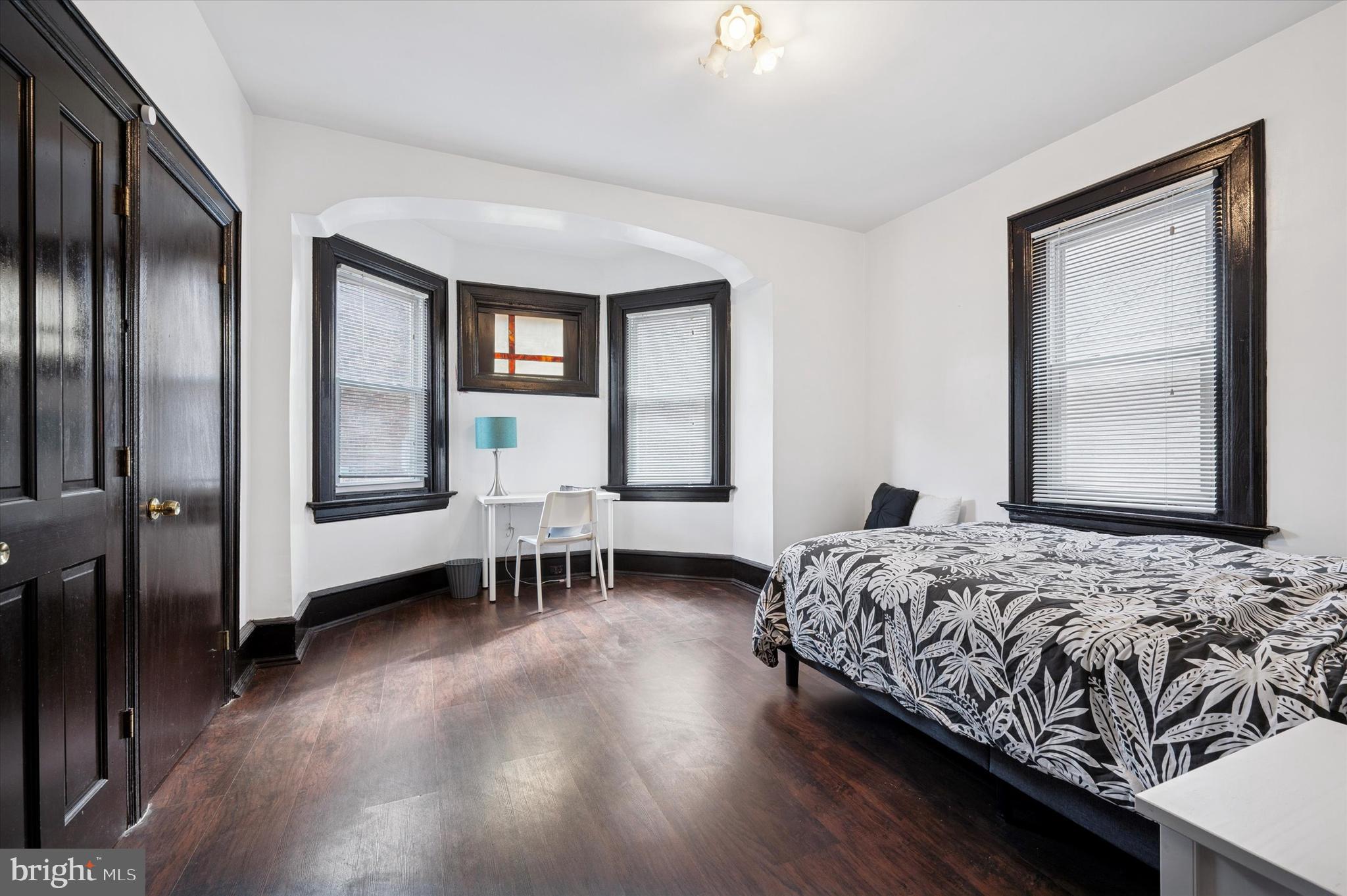 4518 Walnut Street Philadelphia, PA 19139 - Photo 15 of 36 a bedroom with a bed and a window