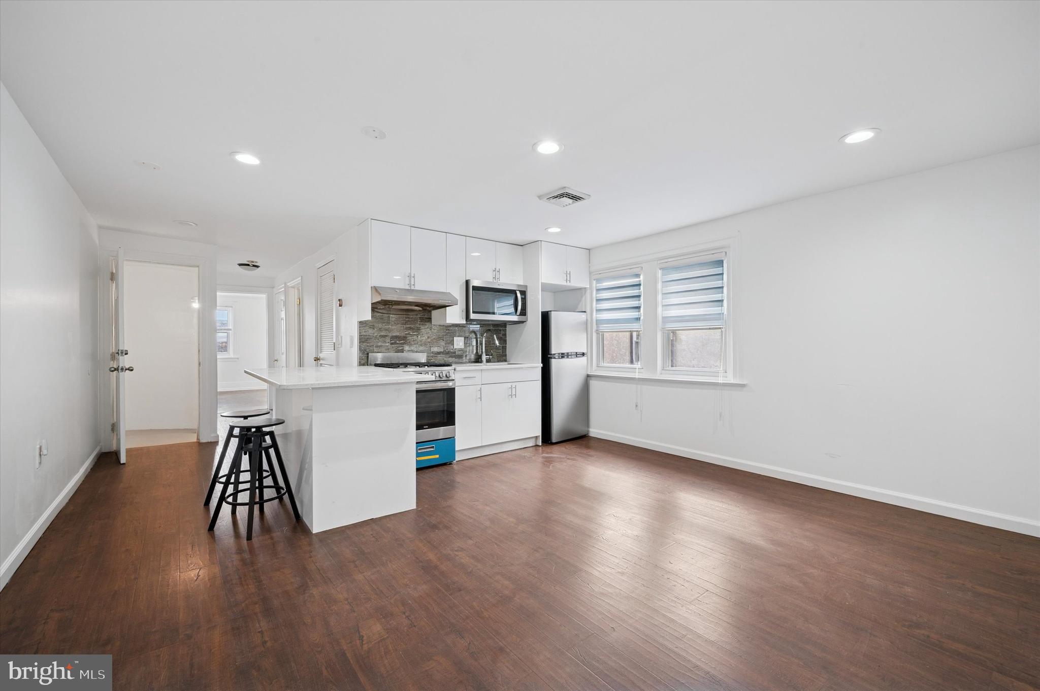 4518 Walnut Street Philadelphia, PA 19139 - Photo 24 of 36 a view of kitchen with stainless steel appliances refrigerator oven and stove