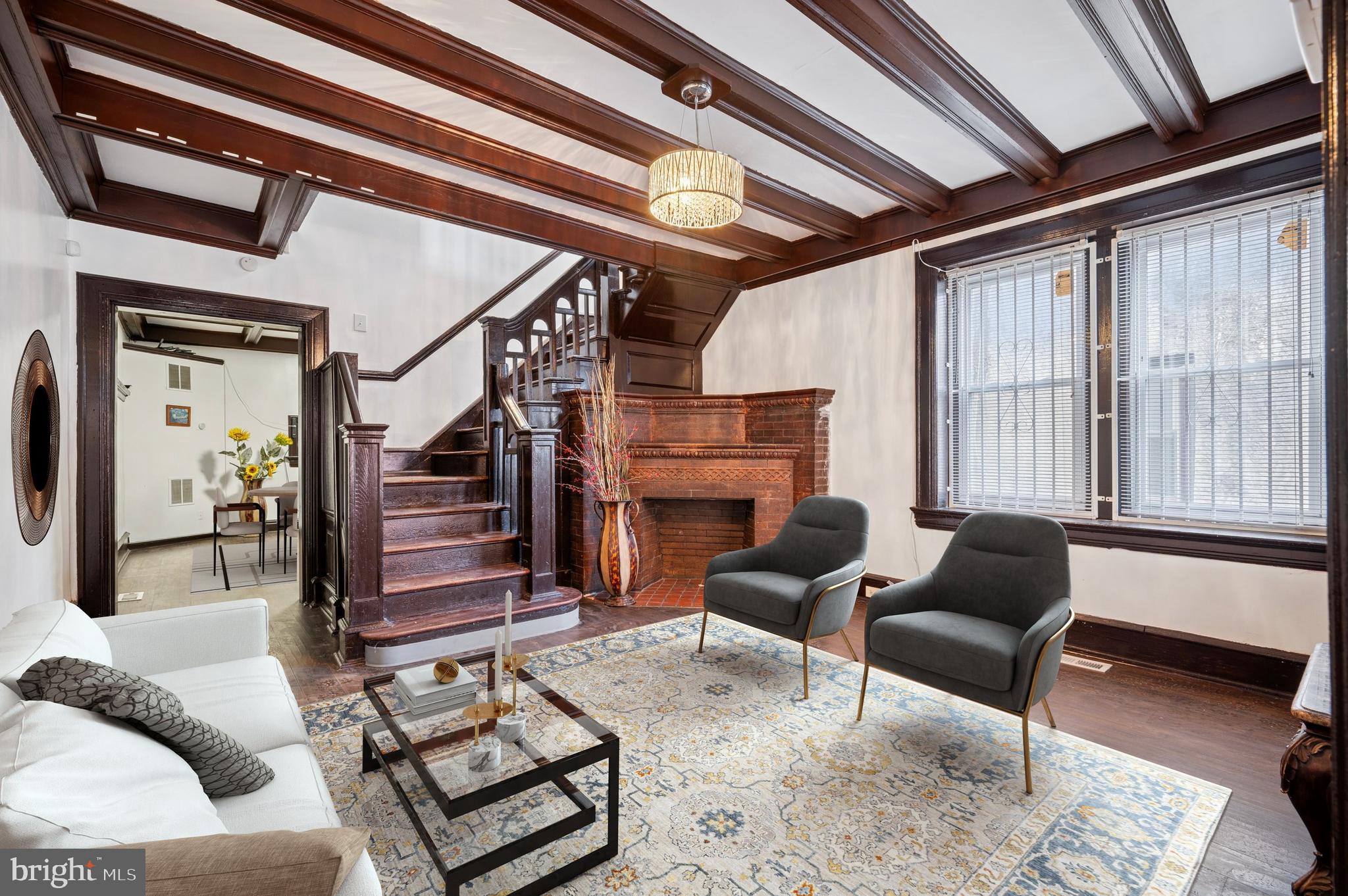 4518 Walnut Street Philadelphia, PA 19139 - Photo 4 of 36 a living room with furniture and a fireplace