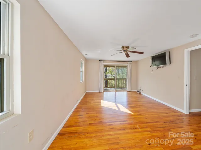 a view of an empty room and window