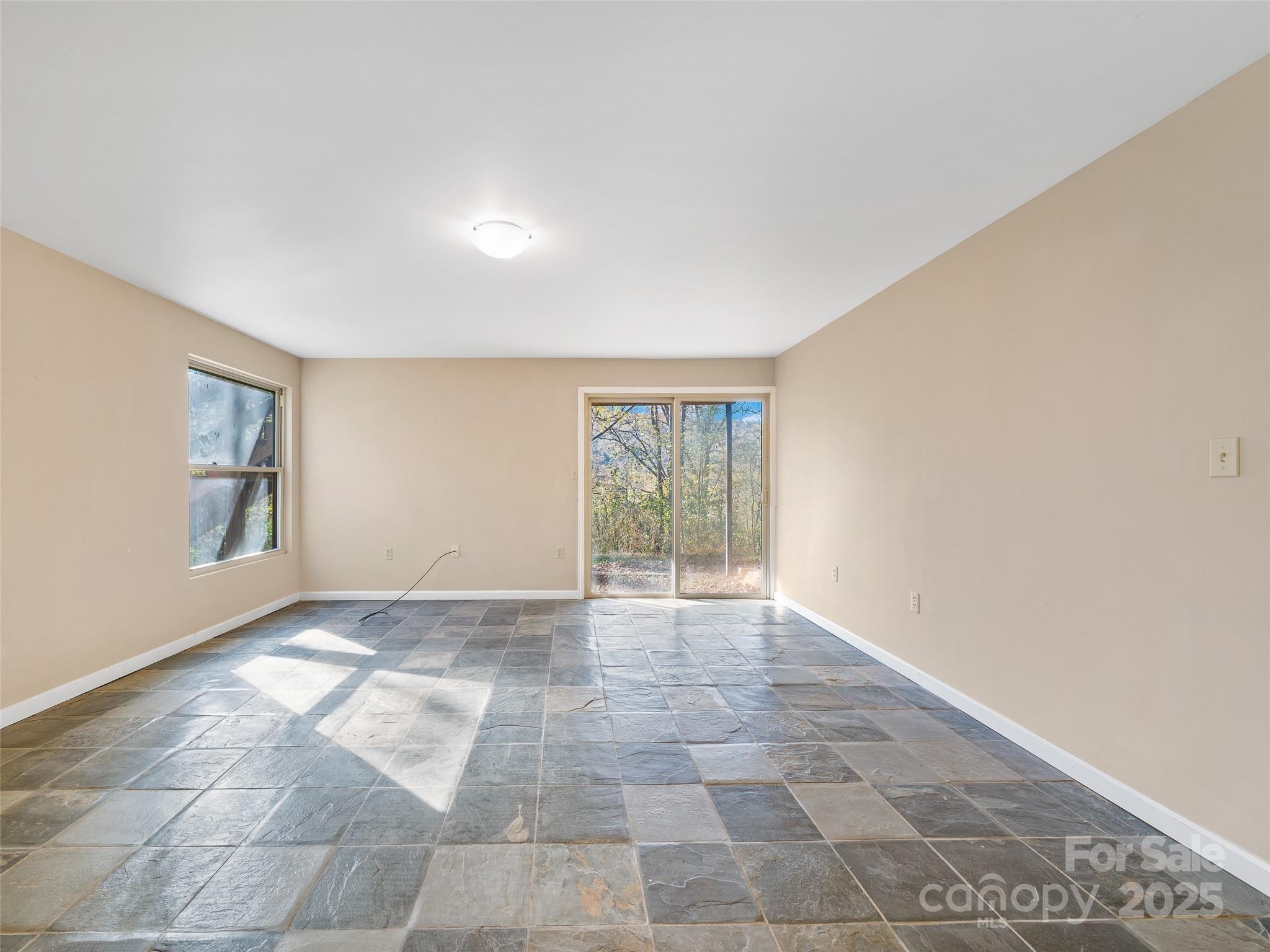 19 Old Patton Hill Road Swannanoa, NC 28778 - Photo 19 of 44 a view of an empty room with a window