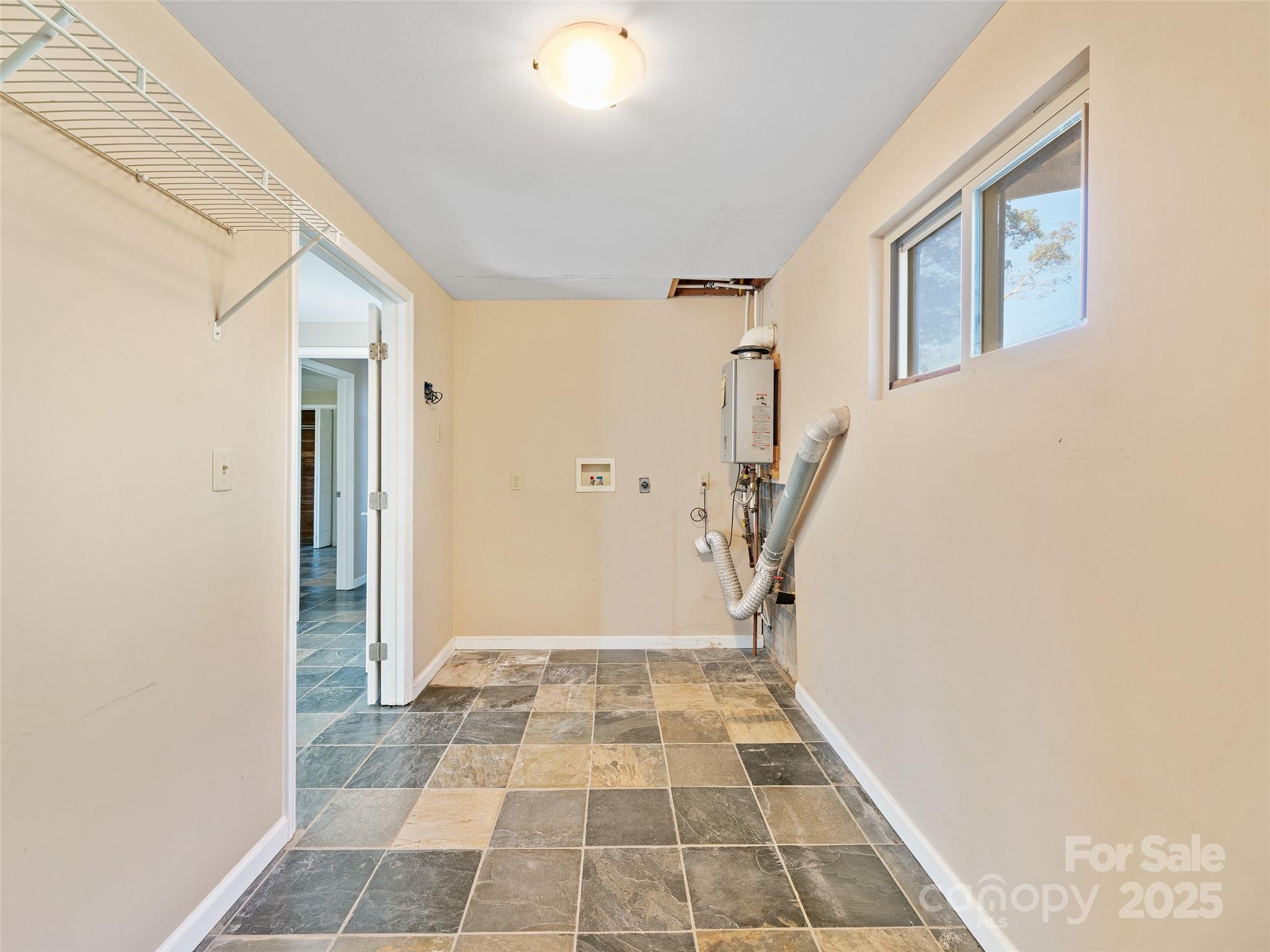 19 Old Patton Hill Road Swannanoa, NC 28778 - Photo 20 of 44 a view of a hallway with a white walls
