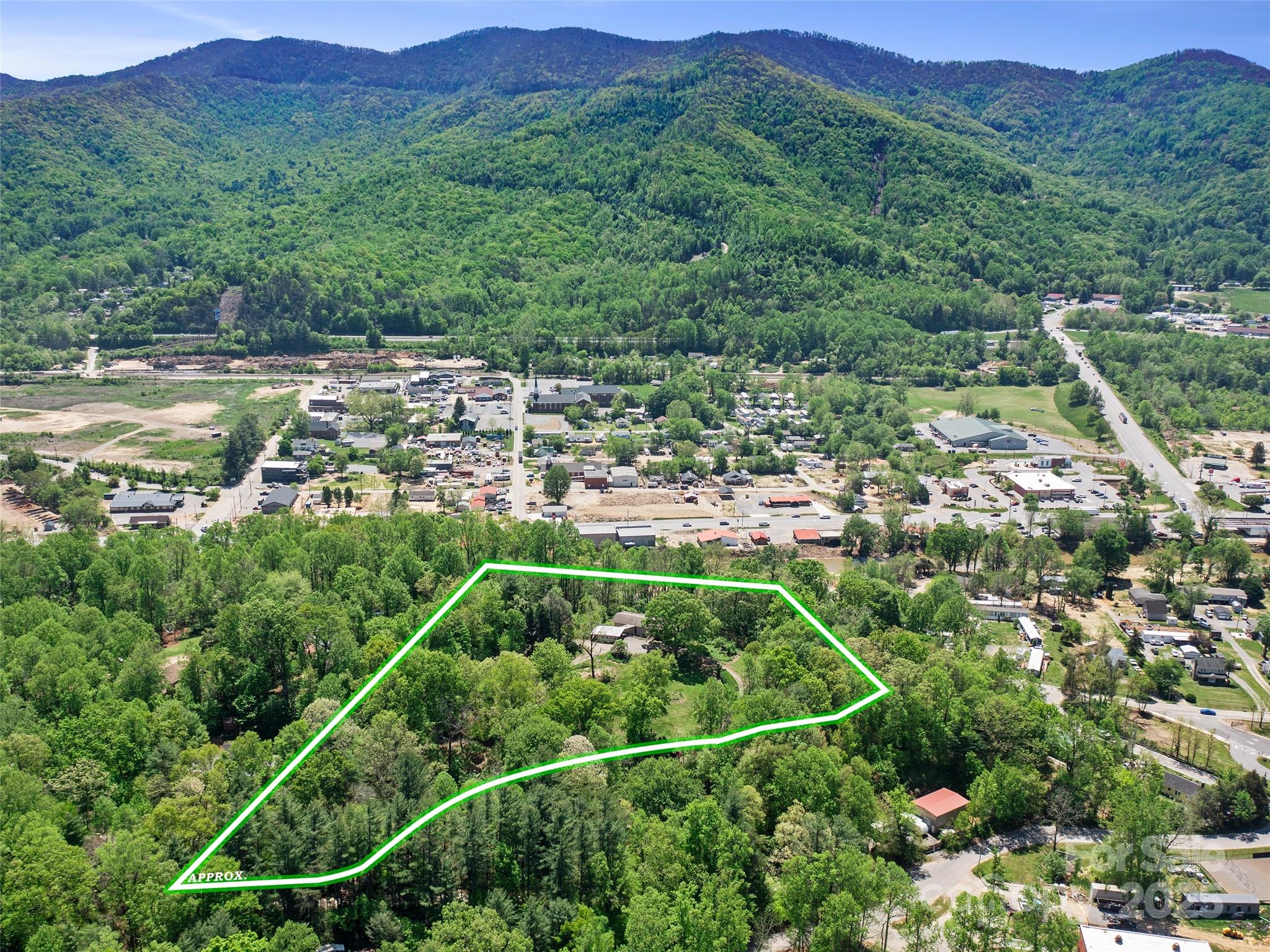 19 Old Patton Hill Road Swannanoa, NC 28778 - Photo 26 of 44 a view of a city with lush green forest