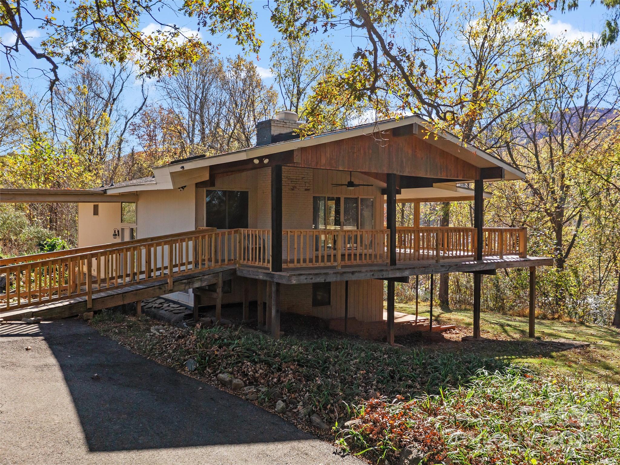 19 Old Patton Hill Road Swannanoa, NC 28778 - Photo 4 of 44 a house view with a garden space
