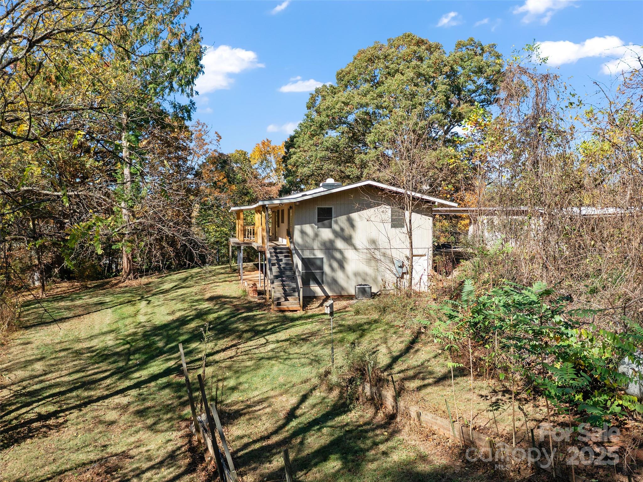 19 Old Patton Hill Road Swannanoa, NC 28778 - Photo 41 of 44 a view of a house with a yard