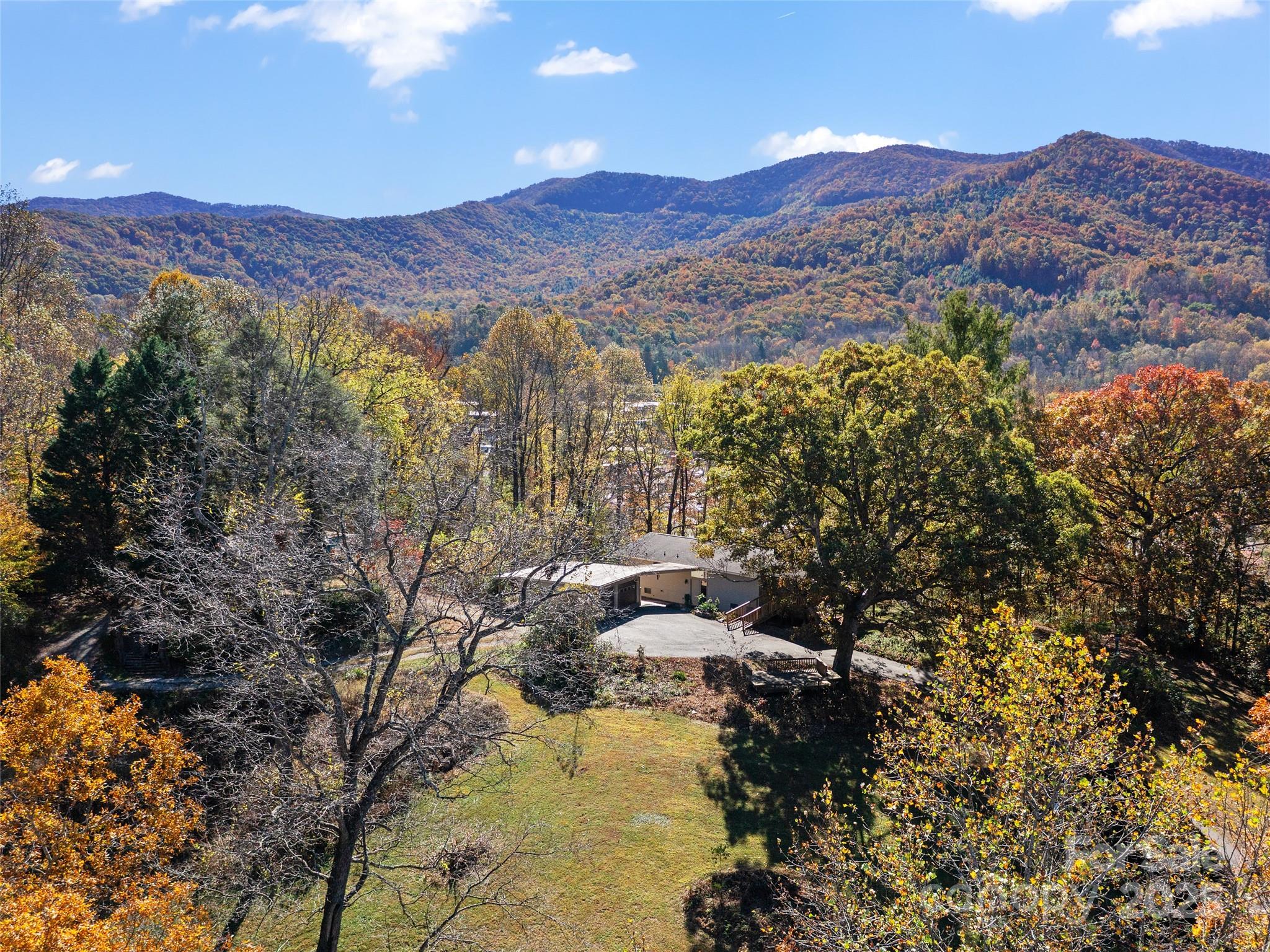 19 Old Patton Hill Road Swannanoa, NC 28778 - Photo 43 of 44 a view of a lush green hillside and a mountain