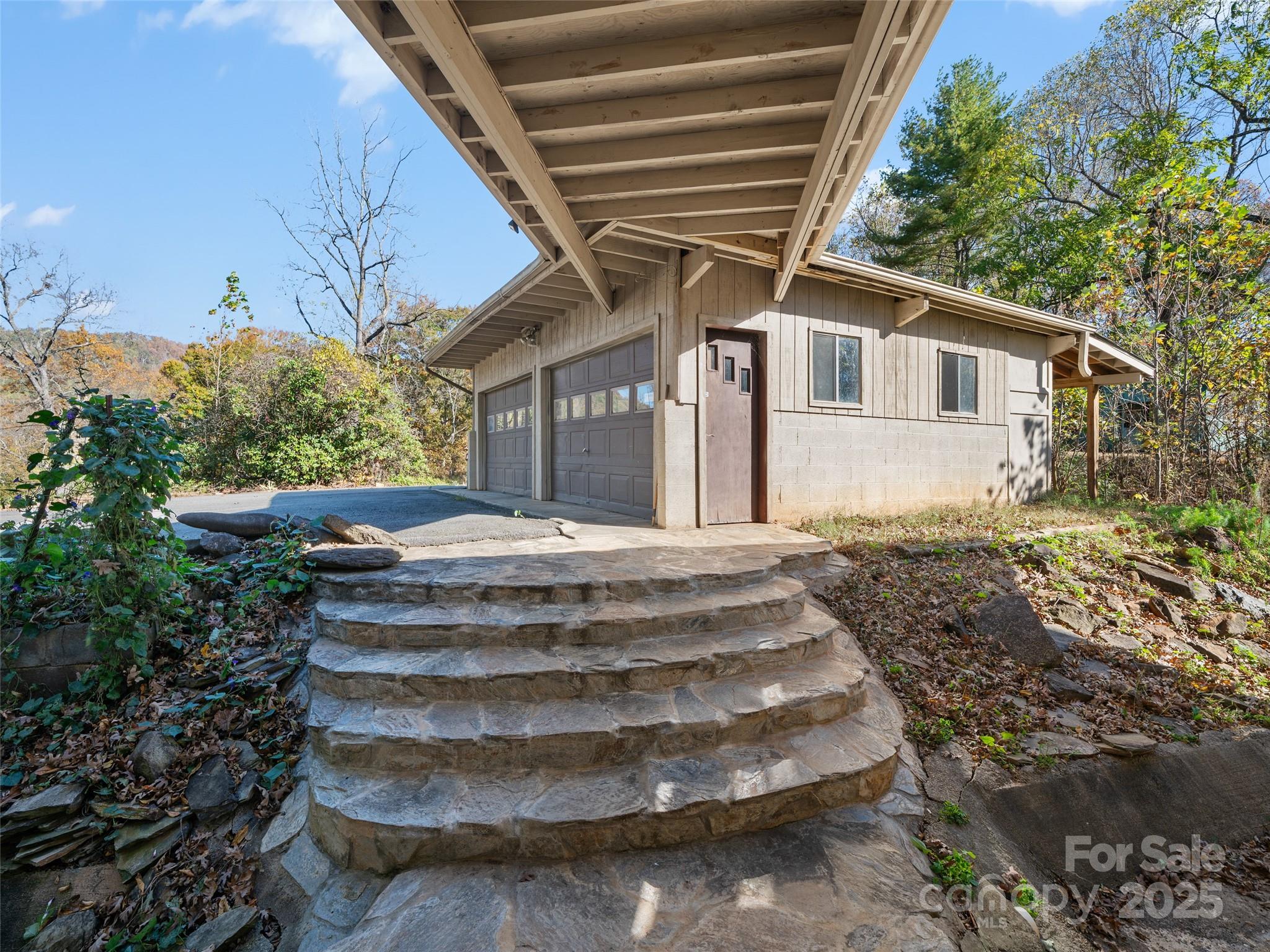 19 Old Patton Hill Road Swannanoa, NC 28778 - Photo 5 of 44 a view of a house with a yard