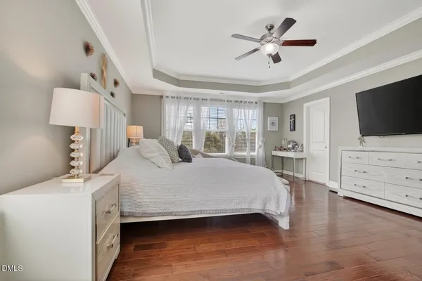 a kitchen with stainless steel appliances kitchen island granite countertop a refrigerator a stove and a sink