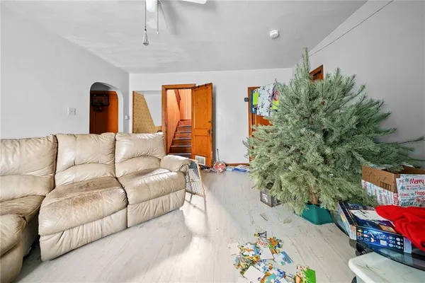 a living room with furniture and a couch