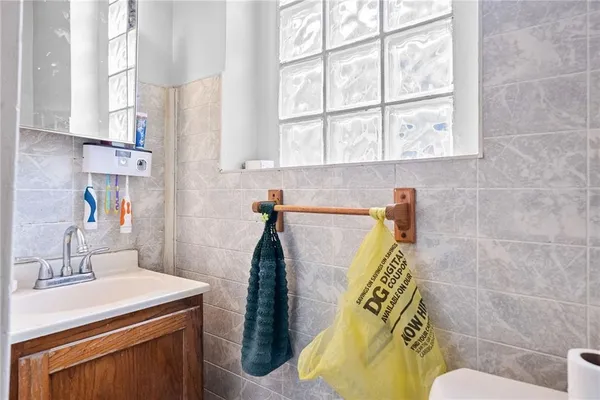 a bathroom with a sink and toilet