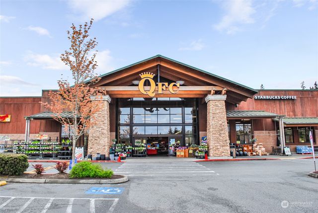 a view of a food mall next to a building