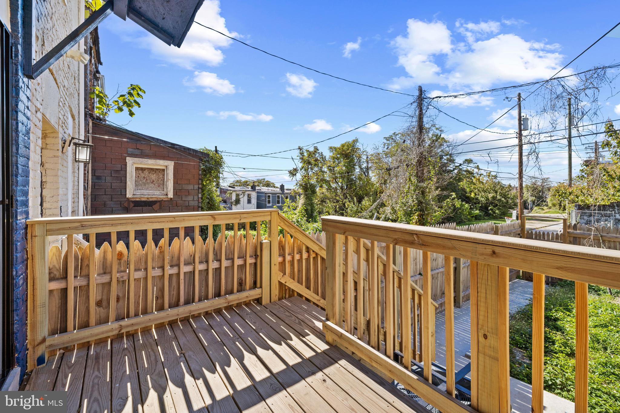 6 South Payson Street Baltimore, MD 21223 - Photo 16 of 17 a view of a balcony with wooden floor