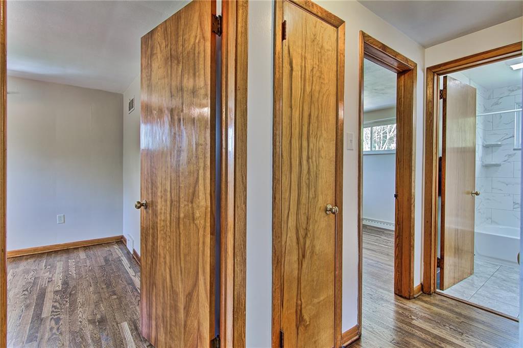 1131 Harvard Road Monroeville, PA 15146 - Photo 11 of 25 Hallway has linen closet and coat closet.