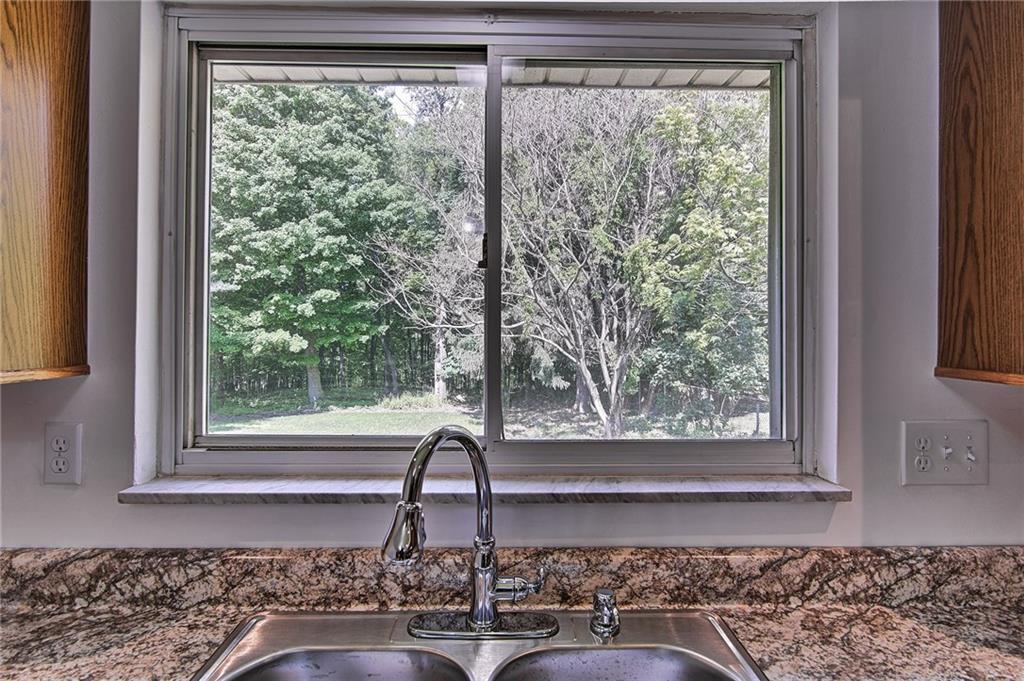 1131 Harvard Road Monroeville, PA 15146 - Photo 9 of 25 Great view of backyard from kitchen sink