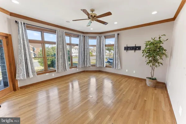 a view of a livingroom with furniture and entryway