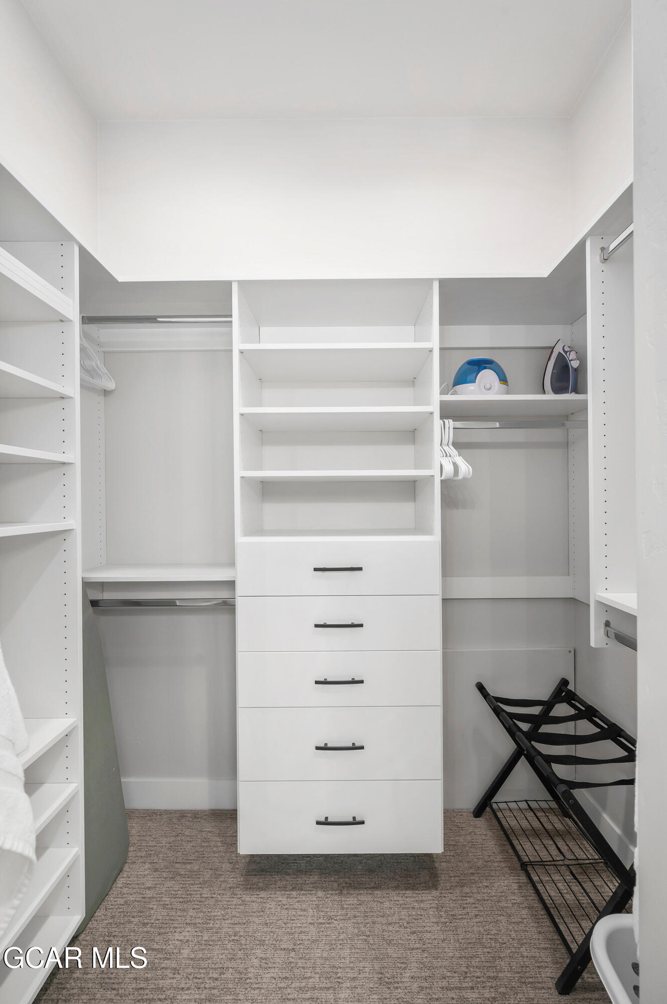 82 Game Trail Fraser, CO 80442 - Photo 22 of 51 a view of walk in closet with empty racks