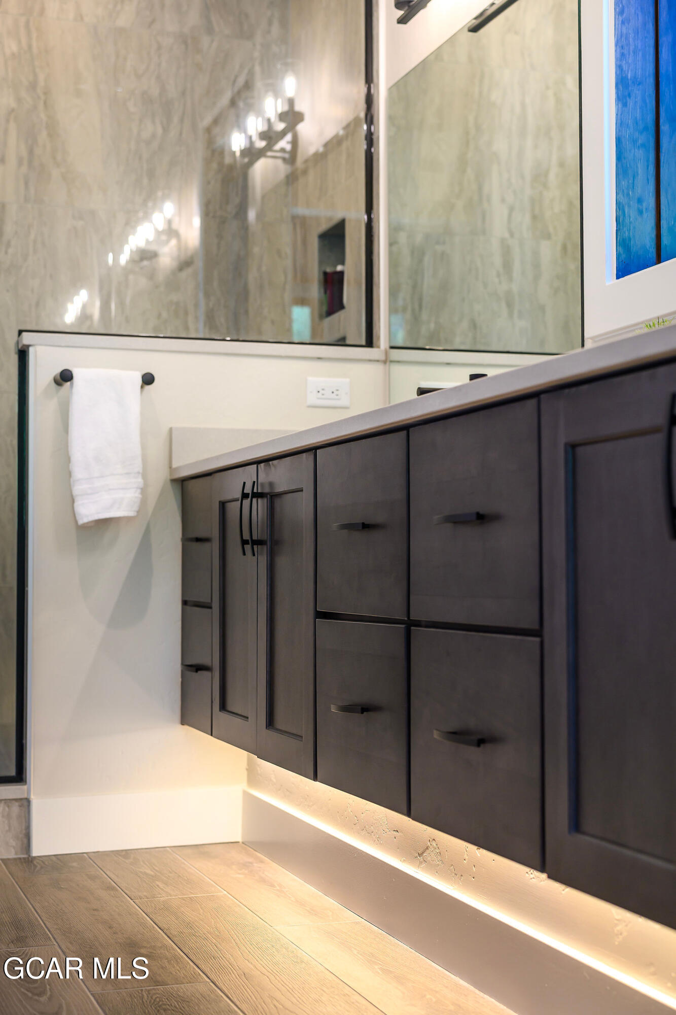 82 Game Trail Fraser, CO 80442 - Photo 31 of 51 a bathroom with a sink and a mirror