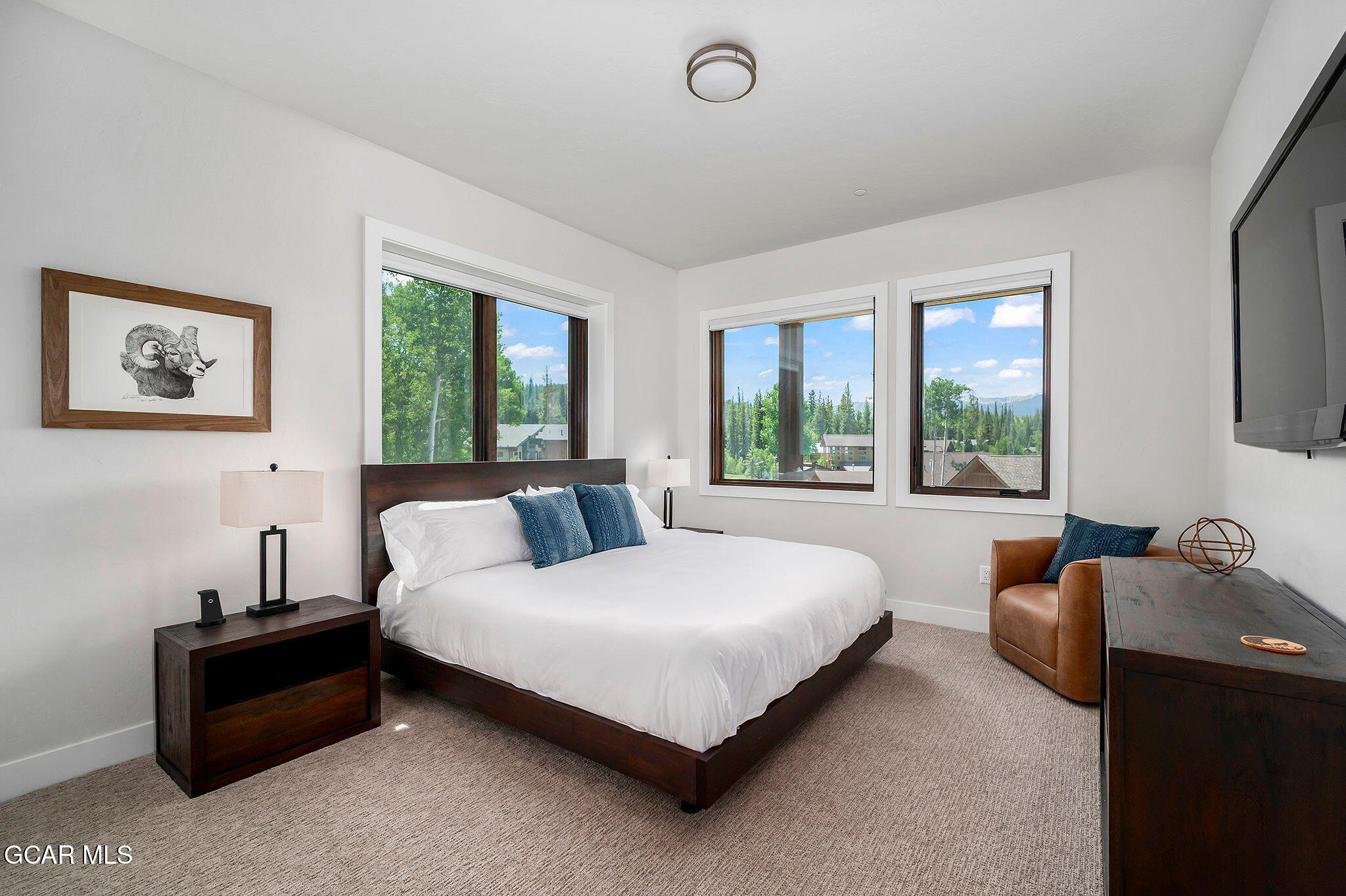 82 Game Trail Fraser, CO 80442 - Photo 32 of 51 a bedroom with a bed and window