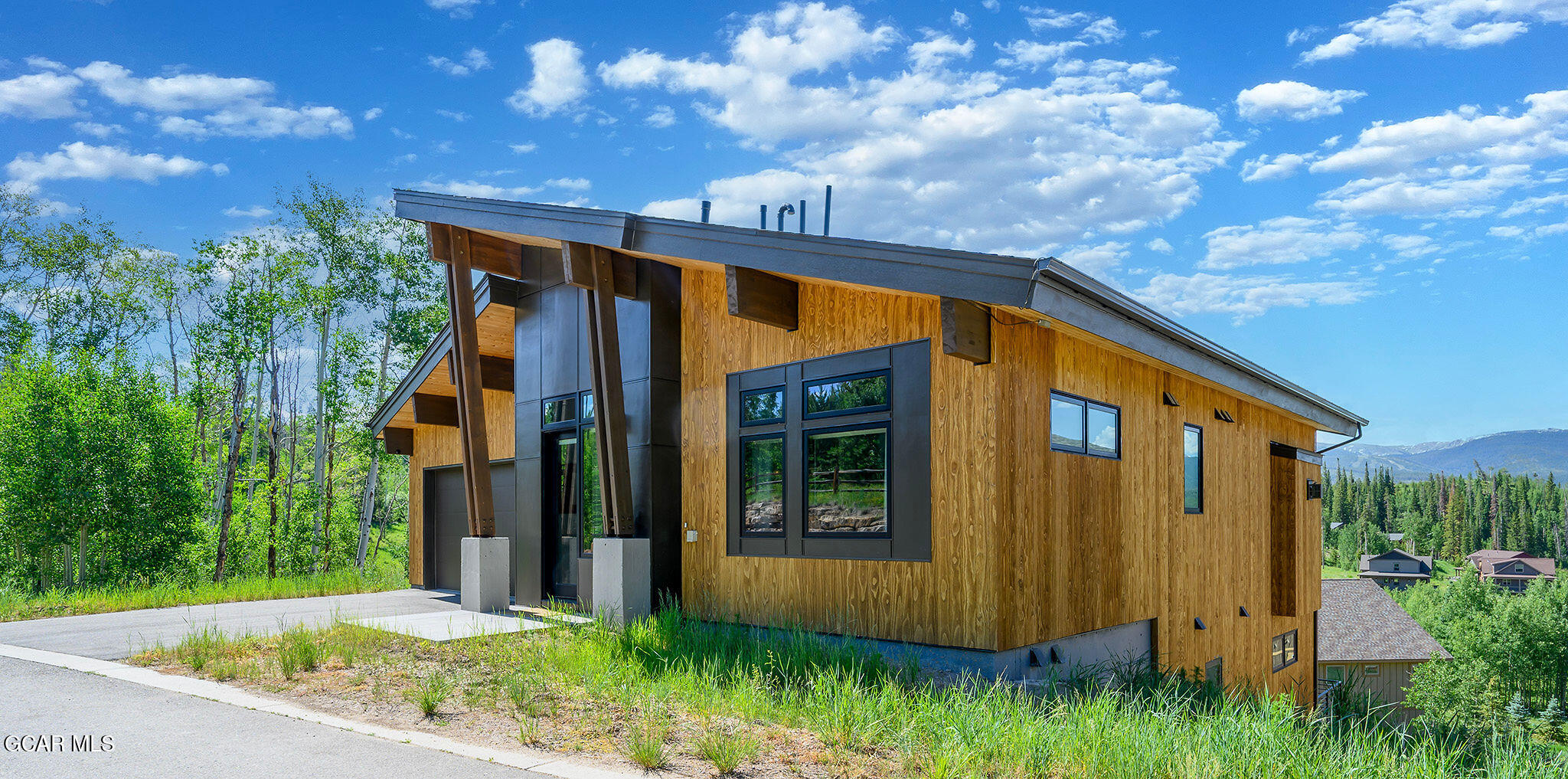 82 Game Trail Fraser, CO 80442 - Photo 39 of 51 a front view of a house with garden