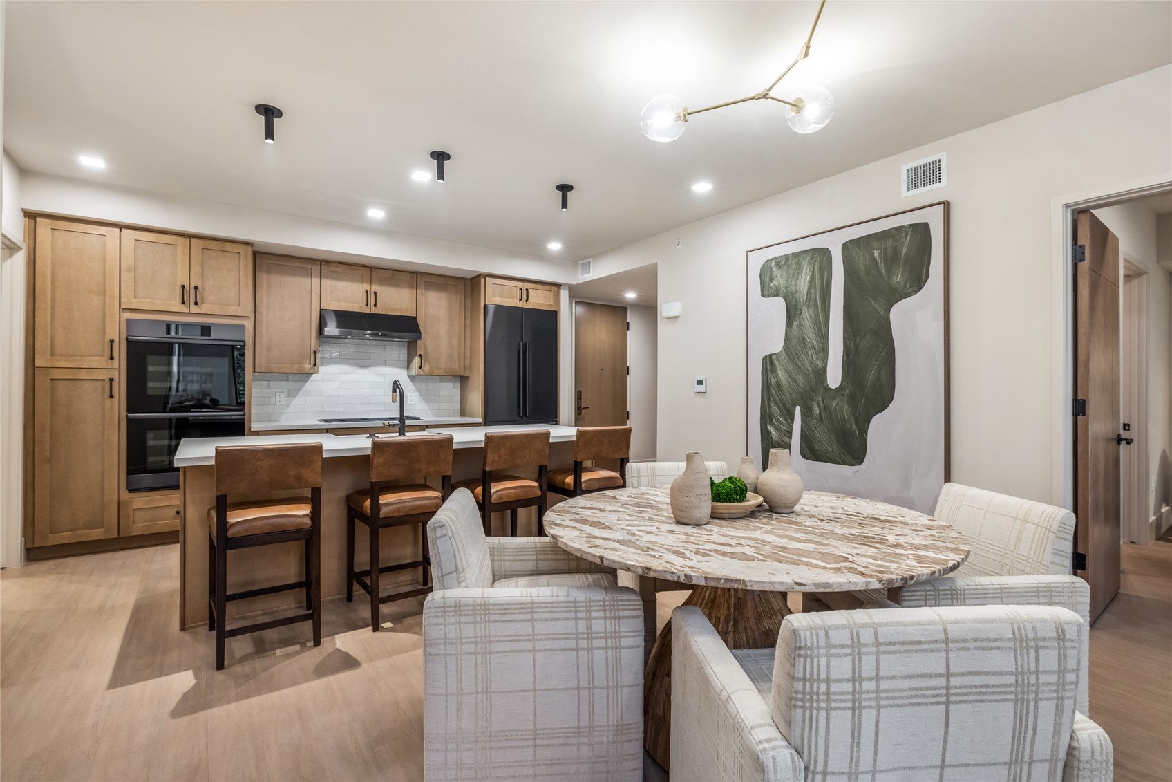 80 West Main Street, Unit 305 Frisco, CO 80443 - Photo 5 of 46 a living room with stainless steel appliances kitchen island granite countertop furniture and a view of kitchen