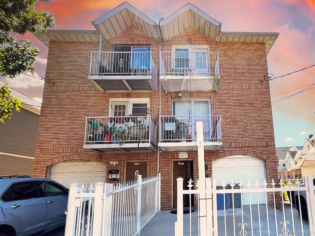 a front view of a house with glass windows
