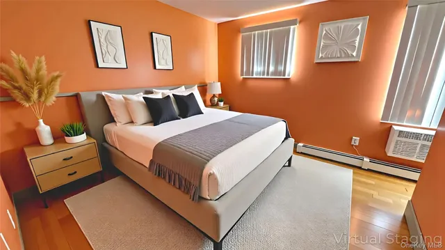 a bed room with a bed and a night stand