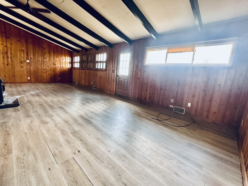 1111 North Bell Avenue Pontiac, IL 61764 - Photo 21 of 35 a view of wooden floor and windows in a room