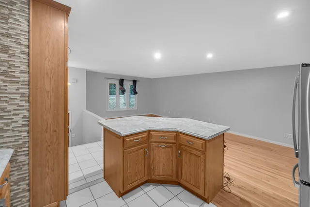 a utility room with faucet washer and dryer