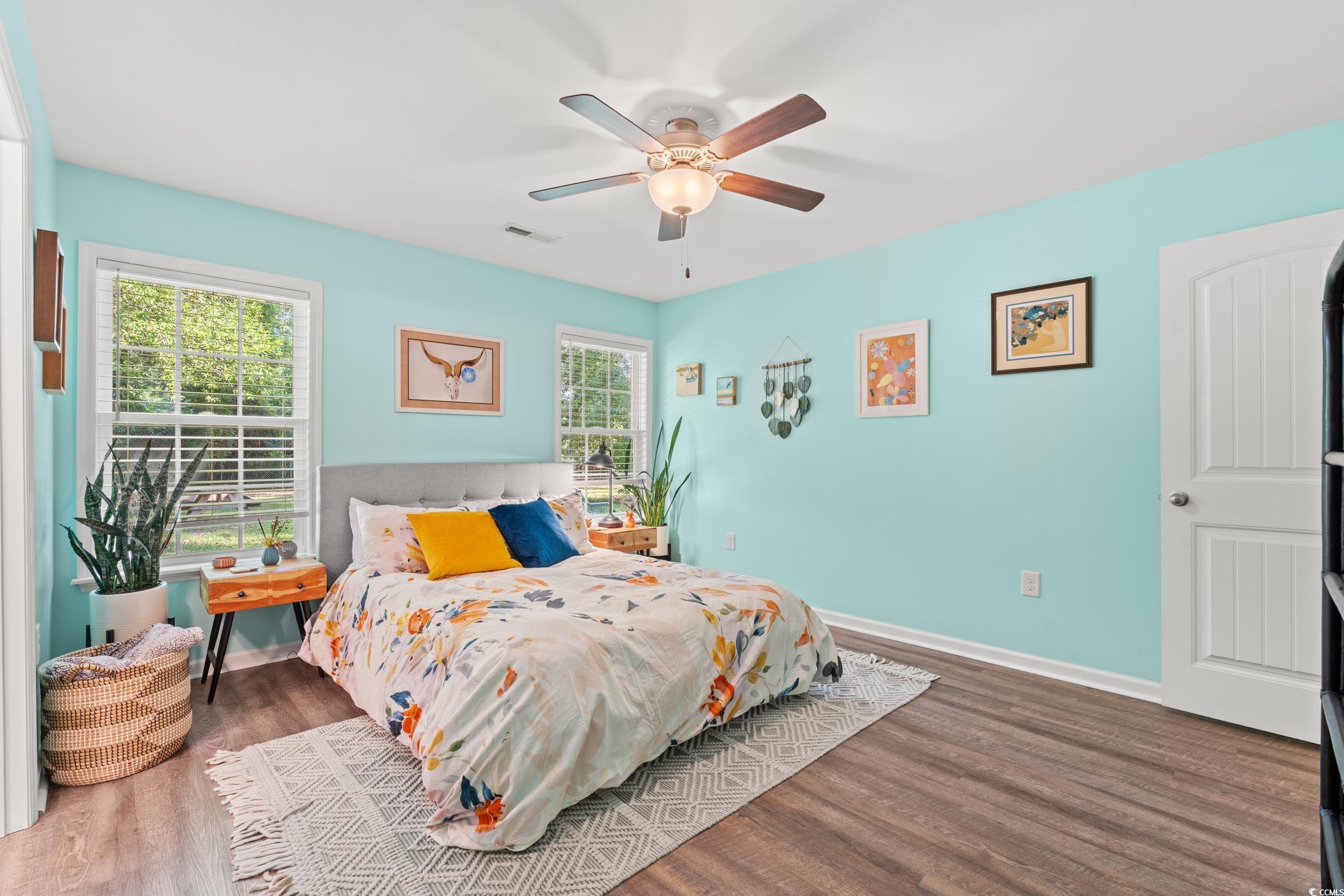 1208 10th Avenue Conway, SC 29526 - Photo 16 of 34 Bedroom with ceiling fan and dark hardwood / wood-
