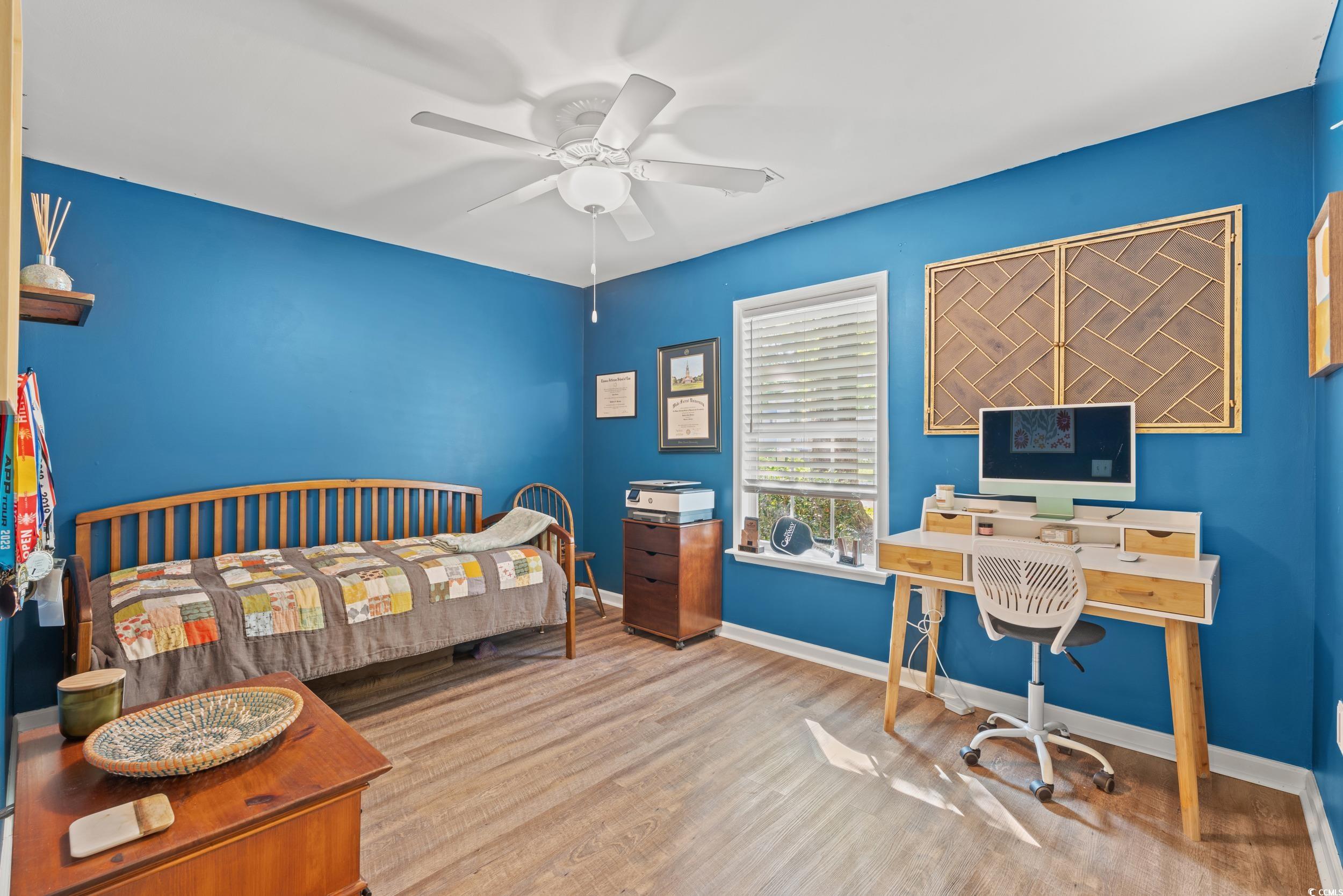 1208 10th Avenue Conway, SC 29526 - Photo 20 of 34 Bedroom featuring light hardwood / wood-style floo
